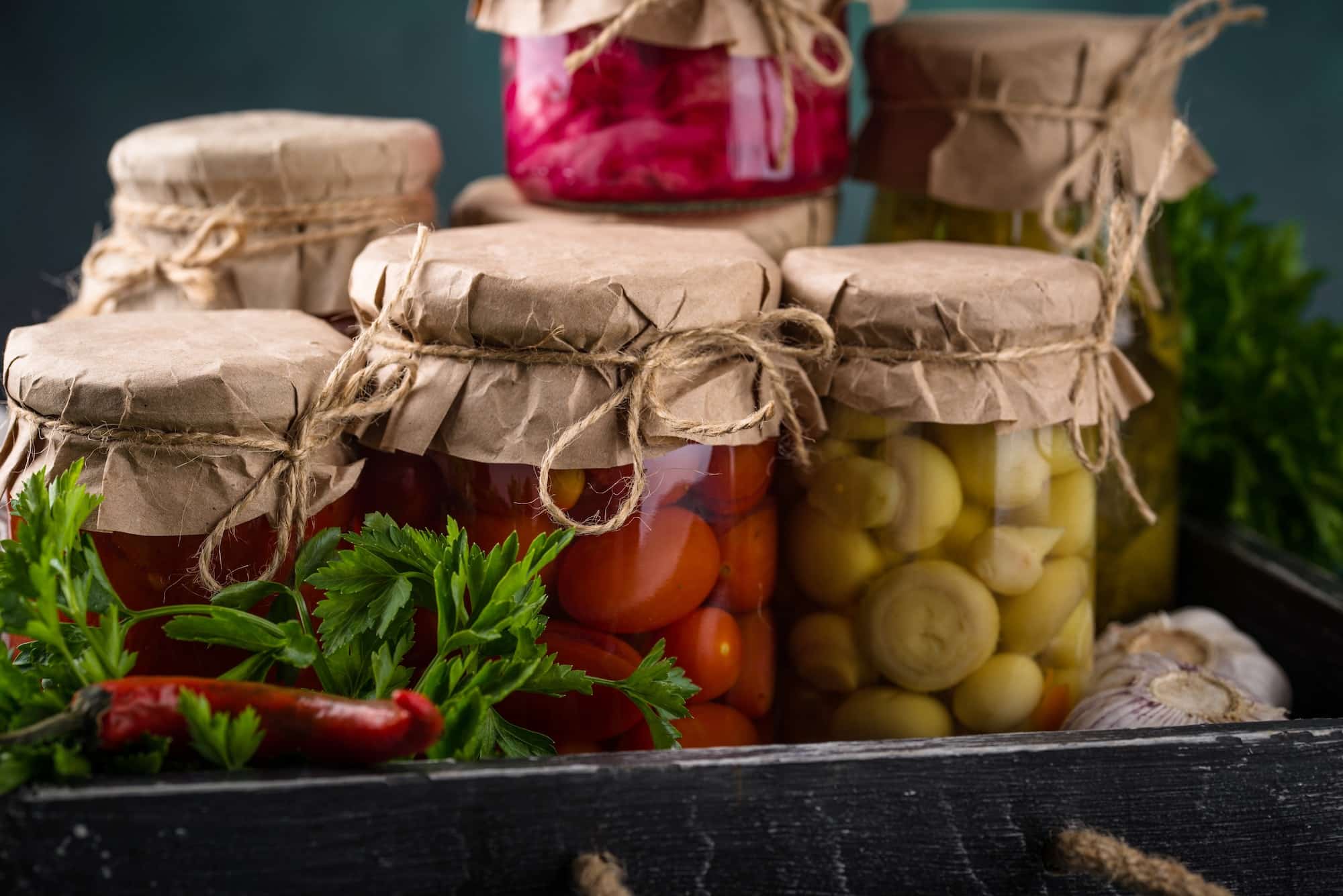 Pickled vegetables in glass jars.