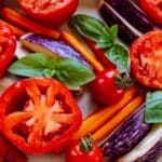 Baked chopped vegetables on a baking sheet. vegetable diet.