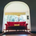 Red couch in home. Home decor